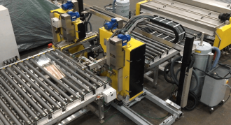 HepcoMotion - Hostile glass seaming application requires heavy duty, corrosion resistant modular solution